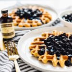 Lemon Poppyseed Waffles with Vanilla Blueberry Sauce